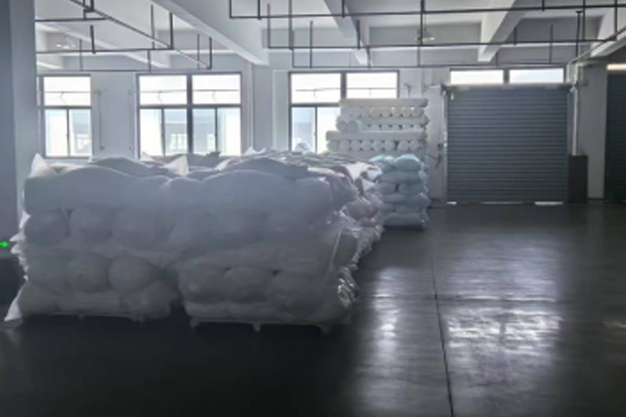 Grå tyg produktion till leverans område