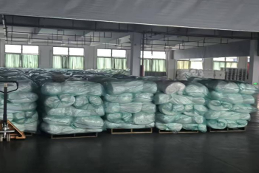 Grå tyg produktion till leverans område